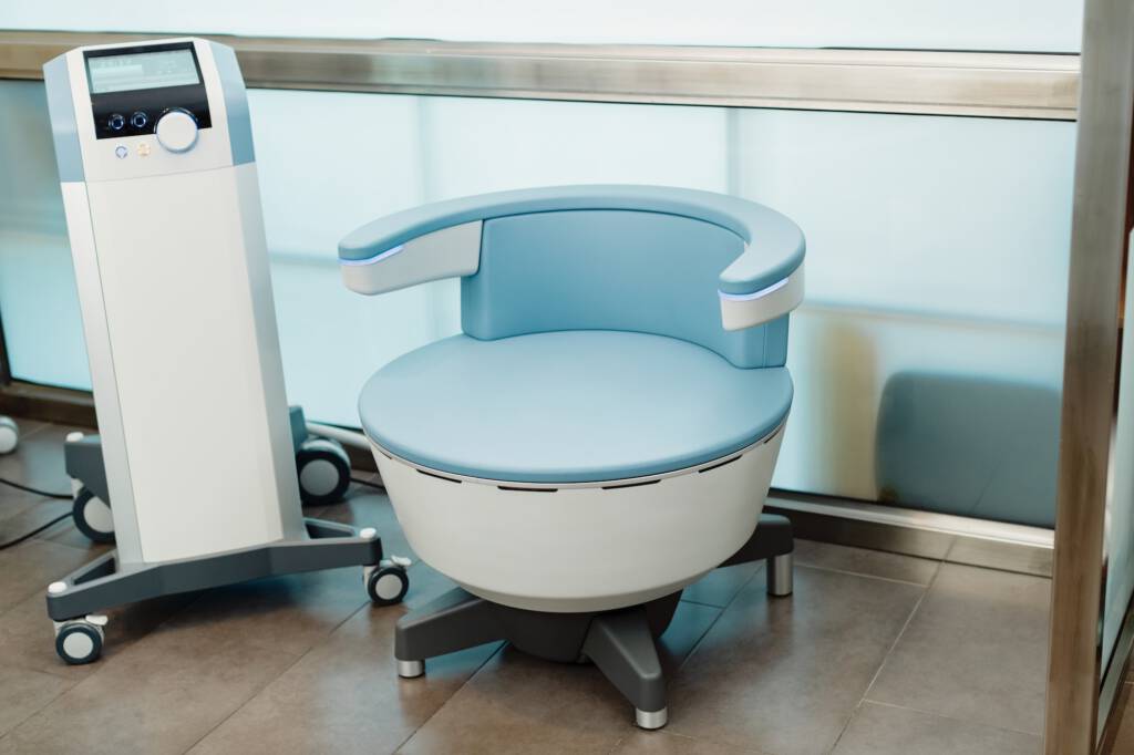 Electromagnetic chair for urinary incontinence treatment at medical clinic.